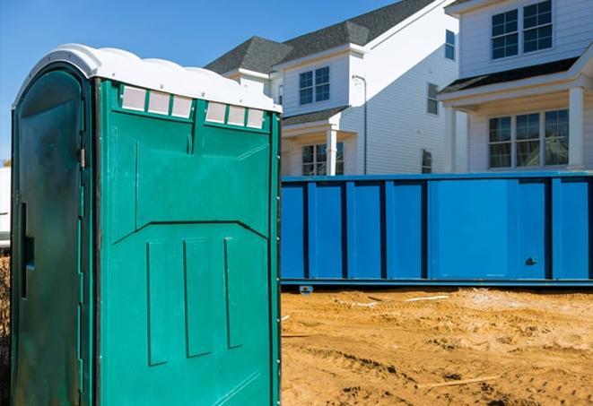 construction crew convenience provided by porta potties on site